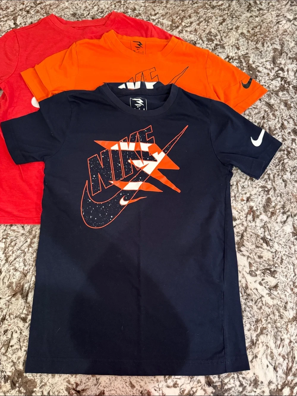 (4) T-shirts. 10/12 size. Nike, Marvel & Cat n Jack